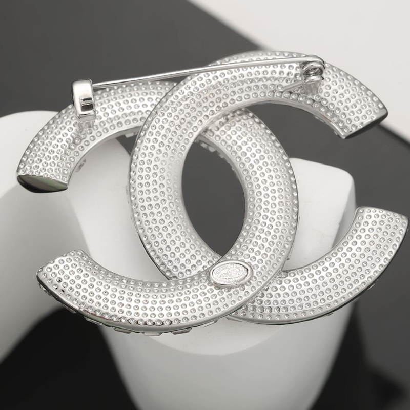 Ch**el brooches
